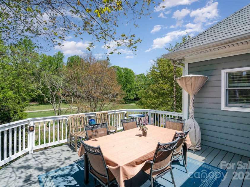 3813 Beauvista Drive, Charlotte, NC 28269.  MLS# CAR4275235, YatesRealty ID 25268. Nice deck with fabulous views