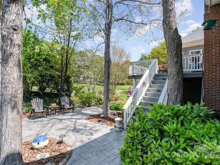 3813 Beauvista Drive, Charlotte, NC 28269.  MLS# CAR4275235, YatesRealty ID 25268. Nice private setting in the backyard with several additional entertaining areas, patio and deck!