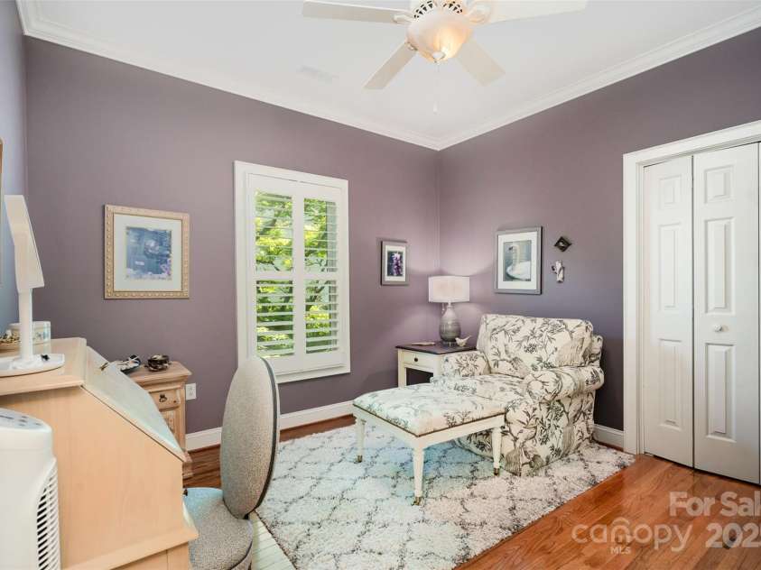 3813 Beauvista Drive, Charlotte, NC 28269.  MLS# CAR4275235, YatesRealty ID 25268. One of the 3 additional bedrooms with warm colors and nice sized closet.