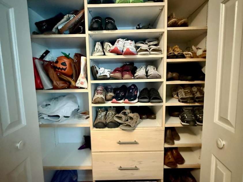 3813 Beauvista Drive, Charlotte, NC 28269.  MLS# CAR4275235, YatesRealty ID 25268. Photo of the bedroom closet which serves as the homeowners office.