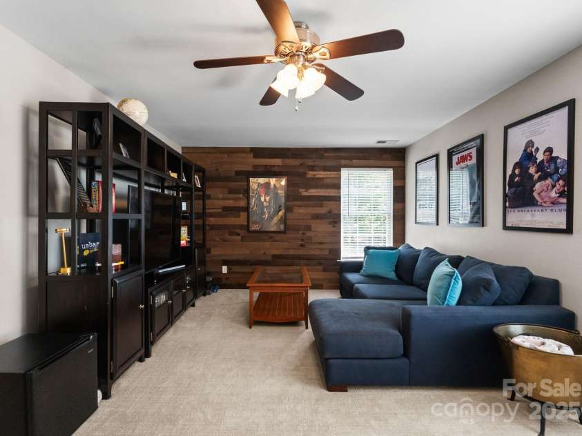 11202 Mountain Pine Drive, Charlotte, NC 28214.  MLS# CAR4273710, YatesRealty ID 25269. Bonus Room with Wood Accented Wall