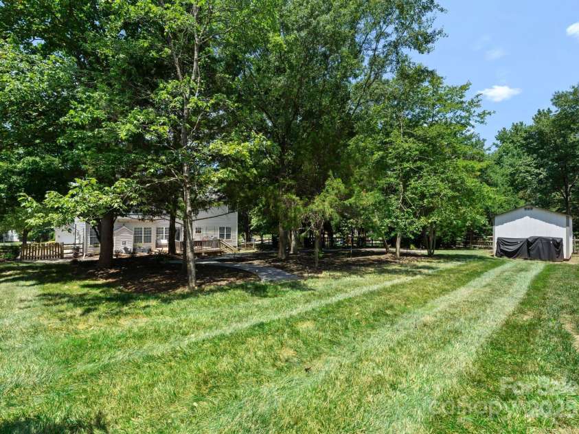 11202 Mountain Pine Drive, Charlotte, NC 28214.  MLS# CAR4273710, YatesRealty ID 25269. Large Level Grassy Area in Backyard