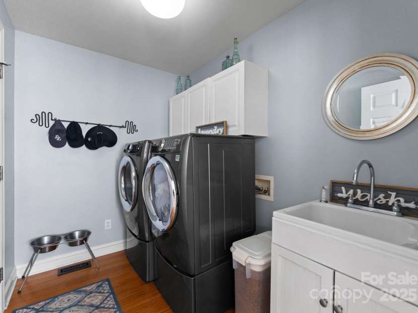 11202 Mountain Pine Drive, Charlotte, NC 28214.  MLS# CAR4273710, YatesRealty ID 25269. Laundry with Sink