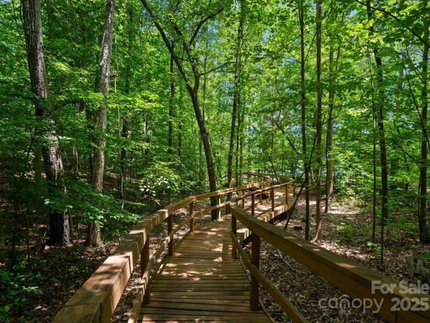 11202 Mountain Pine Drive, Charlotte, NC 28214.  MLS# CAR4273710, YatesRealty ID 25269. Neighborhood Pool and Clubhouse