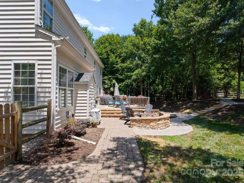 11202 Mountain Pine Drive, Charlotte, NC 28214.  MLS# CAR4273710, YatesRealty ID 25269. Paver Walkway with Firepit
