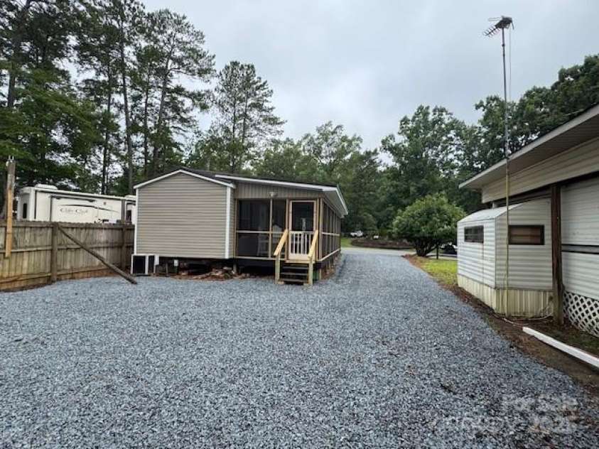 103 Holly Harbor Trail, Mount Gilead, NC 27306.  MLS# CAR4279976, YatesRealty ID 25272. 