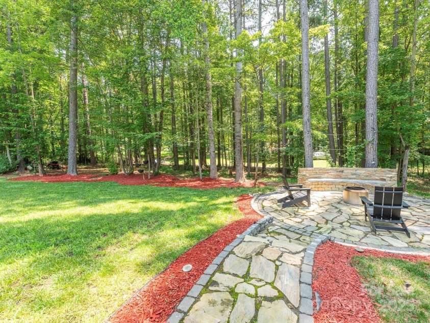 3227 Cape Fox Court, Denver, NC 28037.  MLS# CAR4273425, YatesRealty ID 25276. Backyard path to patio
