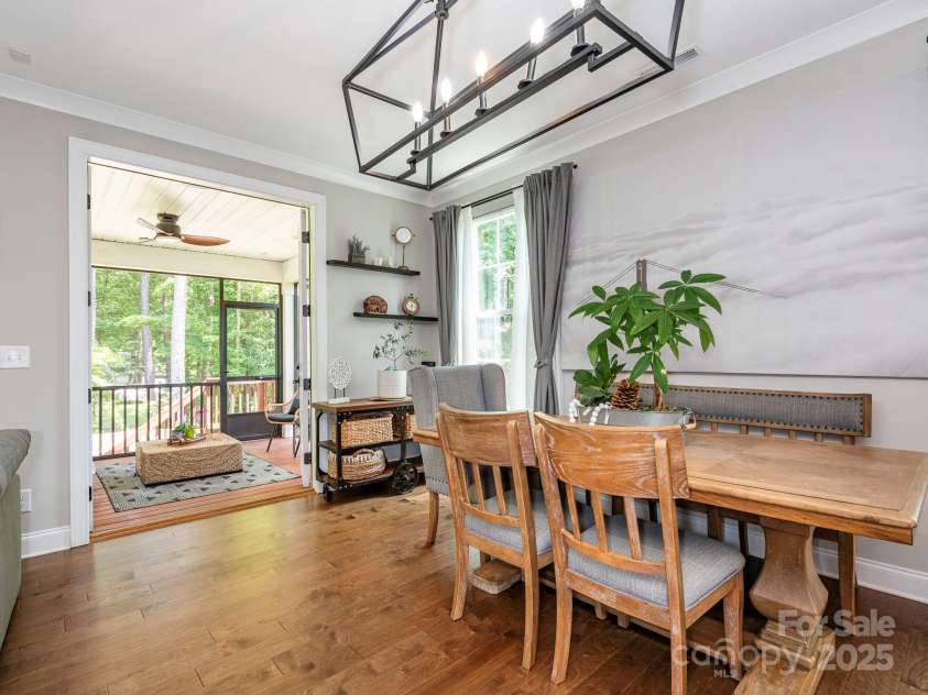 3227 Cape Fox Court, Denver, NC 28037.  MLS# CAR4273425, YatesRealty ID 25276. Dining Area w/ doors to screened-in porch