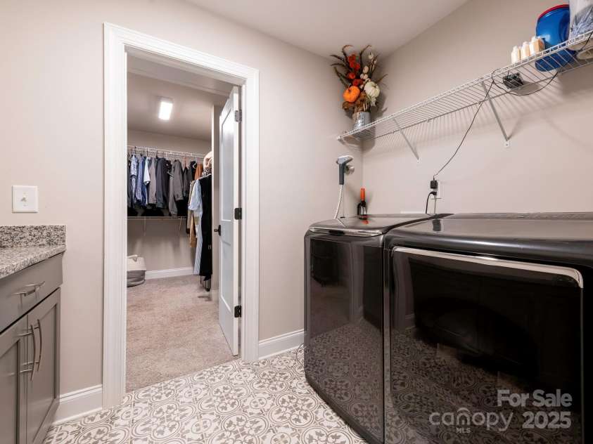3227 Cape Fox Court, Denver, NC 28037.  MLS# CAR4273425, YatesRealty ID 25276. Laundry Room off of Primary Walk-in
