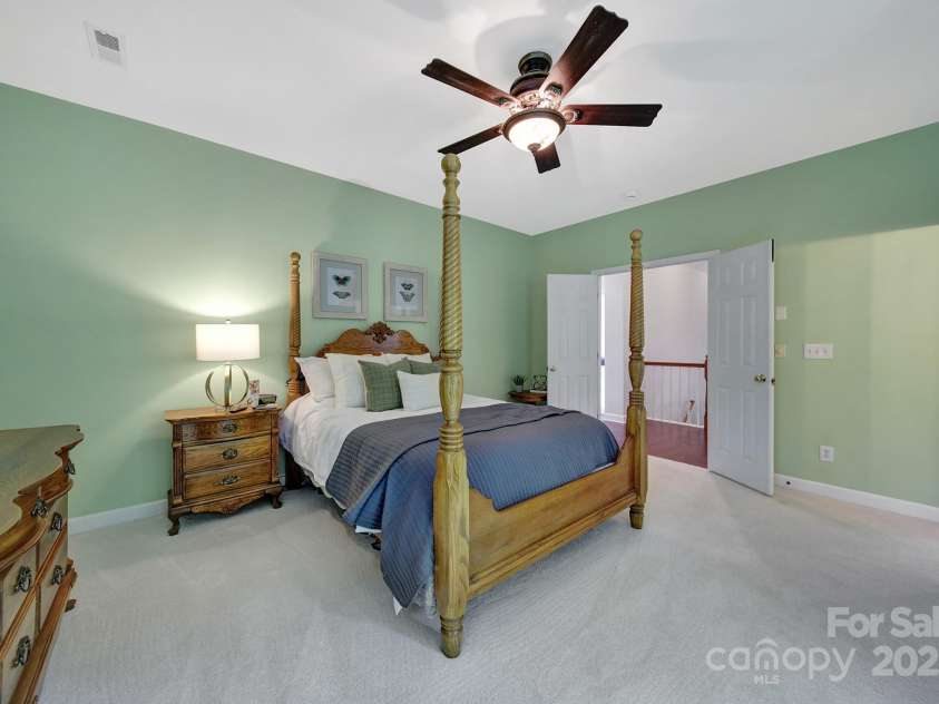 1201 Beckford Glen Drive, Waxhaw, NC 28173.  MLS# CAR4266155, YatesRealty ID 25279. Primary Bedroom with Ceiling Fan and Ensuite Bath