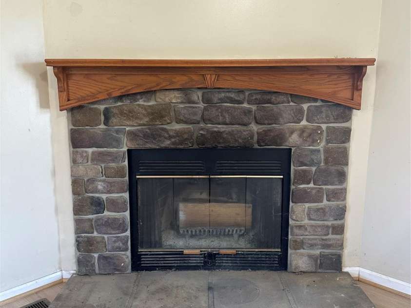 18 Sweet Briar Path Way, Hendersonville, NC 28792.  MLS# CAR4270851, YatesRealty ID 25282. Fireplace in second living space off of kitchen