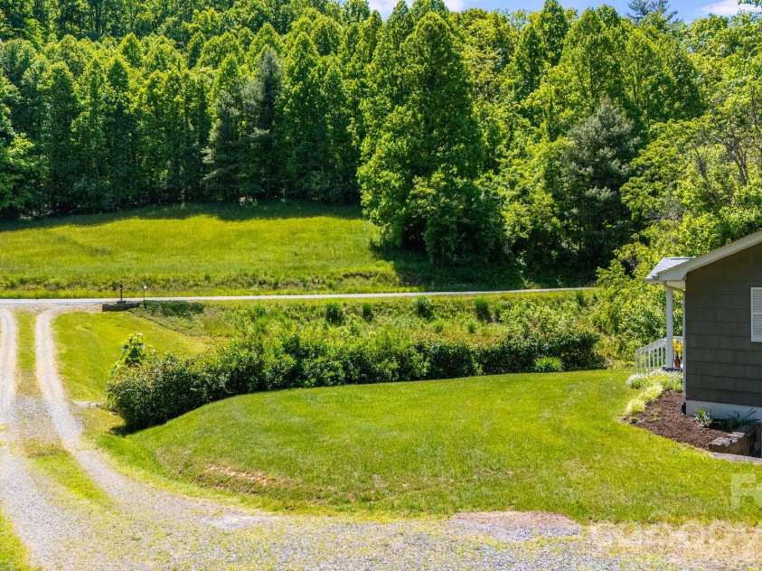 1111 Ammons Branch Road, Marshall, NC 28753.  MLS# CAR4383195, YatesRealty ID 25284. 