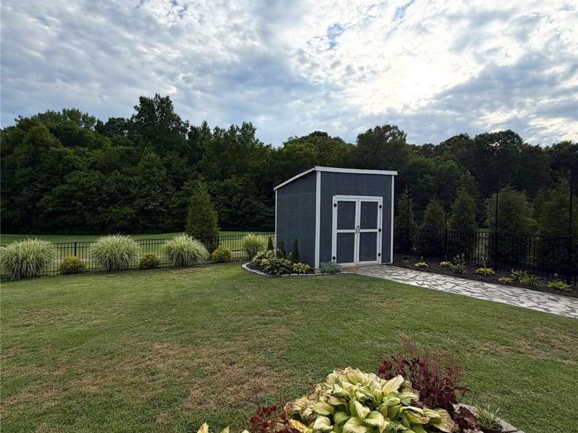11756 Glenwood Drive, Locust, NC 28097.  MLS# CAR4375781, YatesRealty ID 25289. 