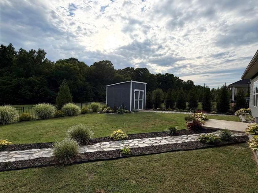 11756 Glenwood Drive, Locust, NC 28097.  MLS# CAR4375781, YatesRealty ID 25289. 