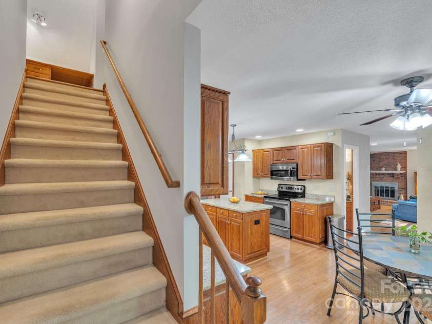 5024 Ardenwoods Drive, Charlotte, NC 28215.  MLS# CAR4278121, YatesRealty ID 25289. Back Staircase (secondary)