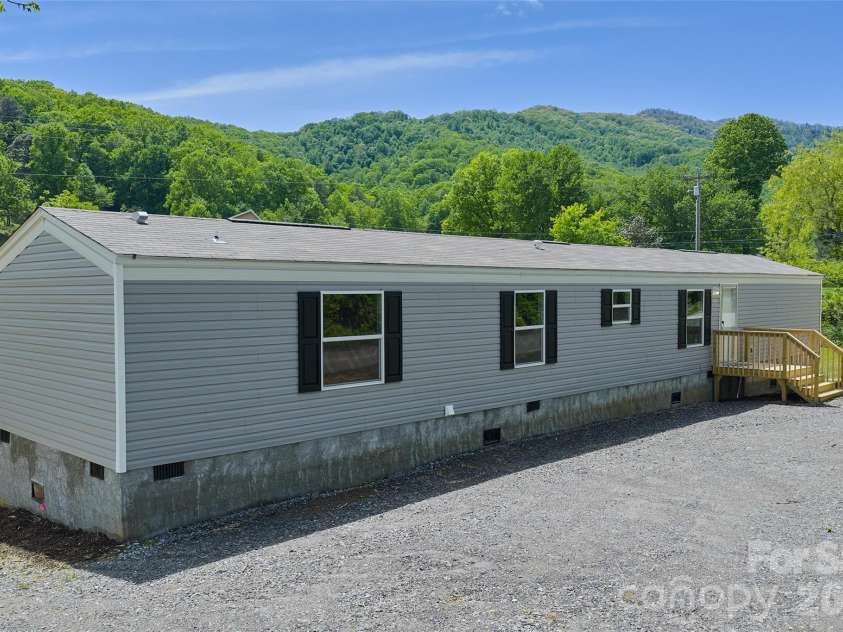 265 Curtis Creek Road, Candler, NC 28715.  MLS# CAR4373081, YatesRealty ID 25291. 
