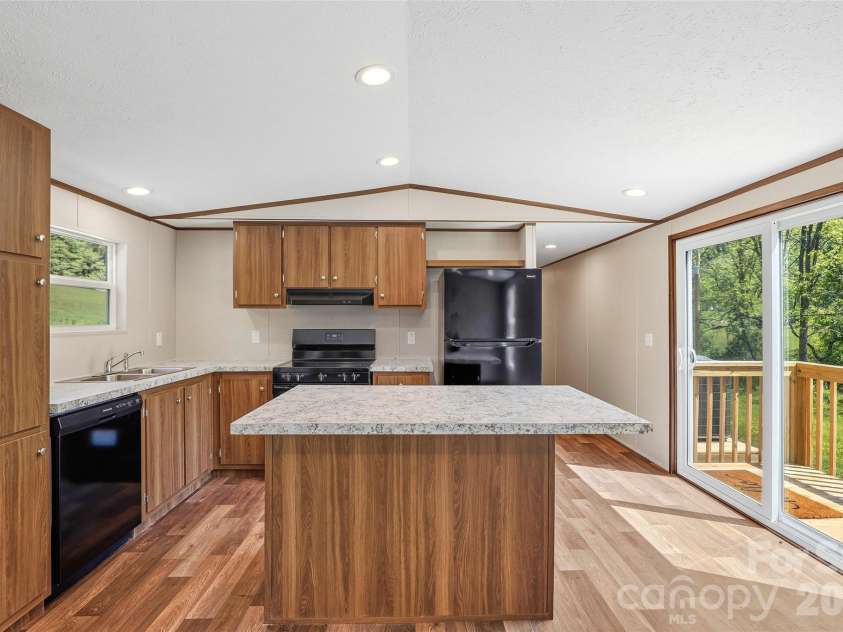 265 Curtis Creek Road, Candler, NC 28715.  MLS# CAR4373081, YatesRealty ID 25291. 