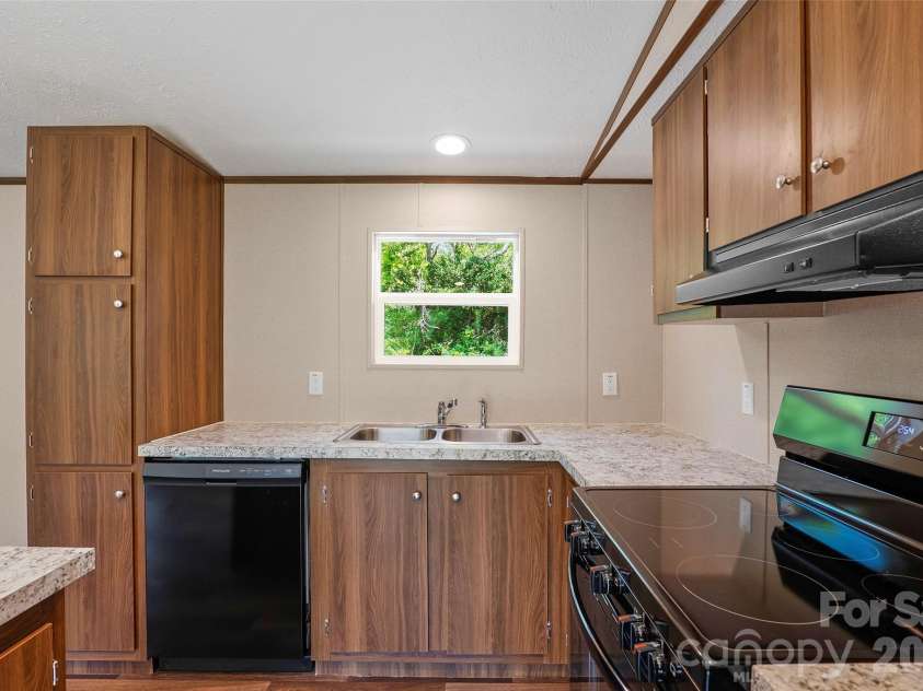 265 Curtis Creek Road, Candler, NC 28715.  MLS# CAR4373081, YatesRealty ID 25291. 