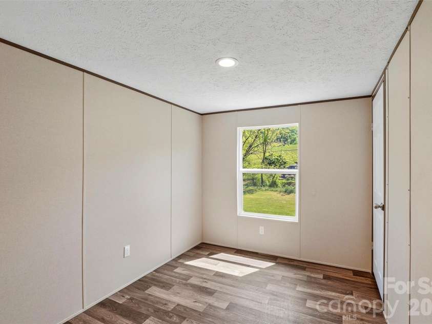 265 Curtis Creek Road, Candler, NC 28715.  MLS# CAR4373081, YatesRealty ID 25291. 