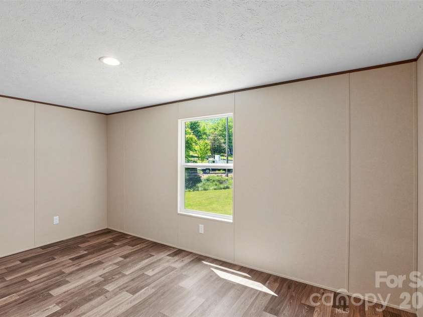 265 Curtis Creek Road, Candler, NC 28715.  MLS# CAR4373081, YatesRealty ID 25291. 
