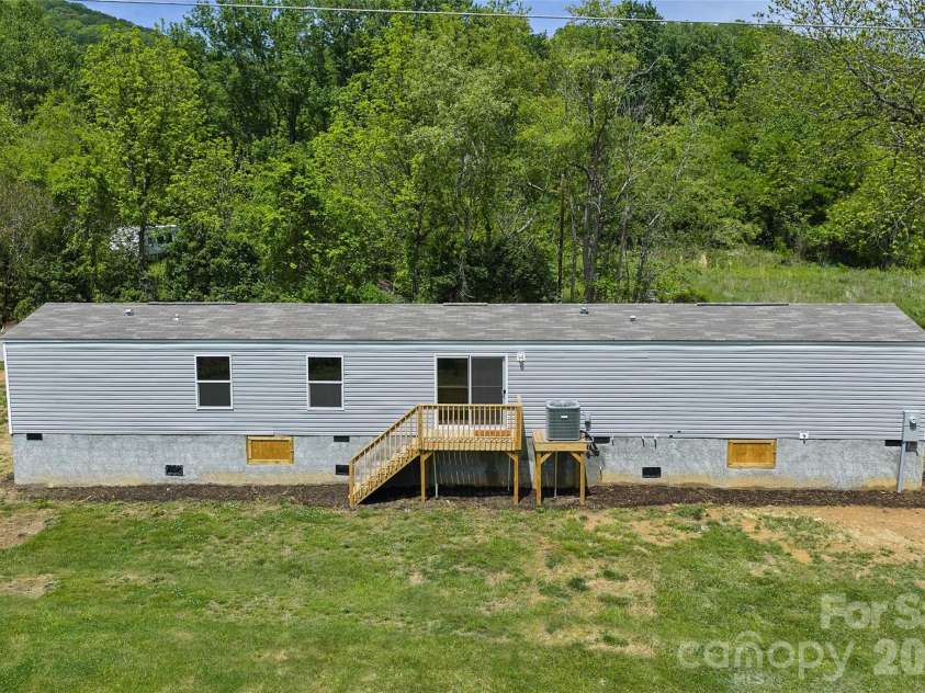 265 Curtis Creek Road, Candler, NC 28715.  MLS# CAR4373081, YatesRealty ID 25291. 