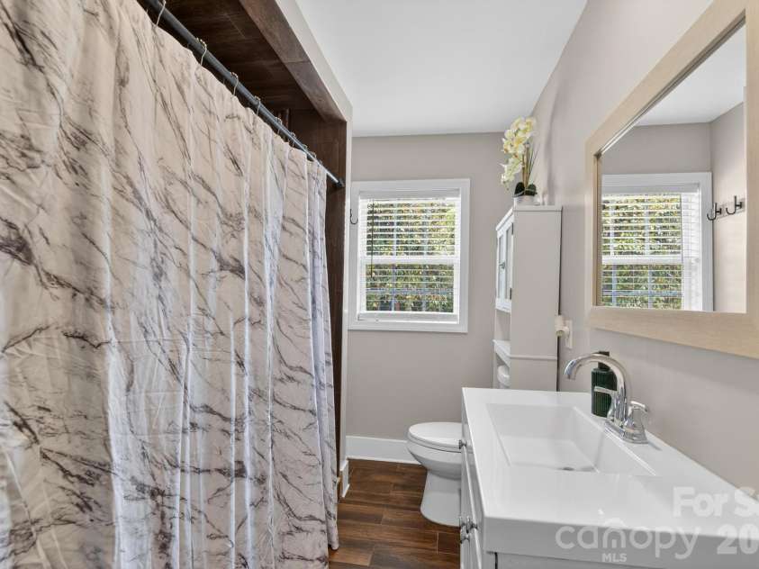 2076 Connelly Springs Road, Lenoir, NC 28645.  MLS# CAR4380178, YatesRealty ID 25293. Full bath with modern vanity 