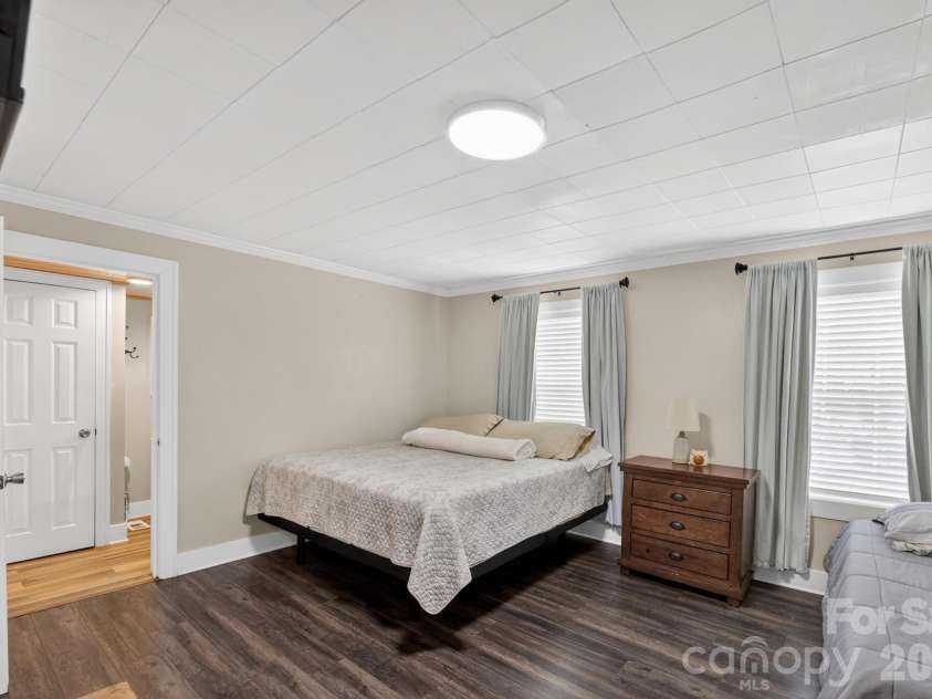 2076 Connelly Springs Road, Lenoir, NC 28645.  MLS# CAR4380178, YatesRealty ID 25293. Primary bedroom- main level 