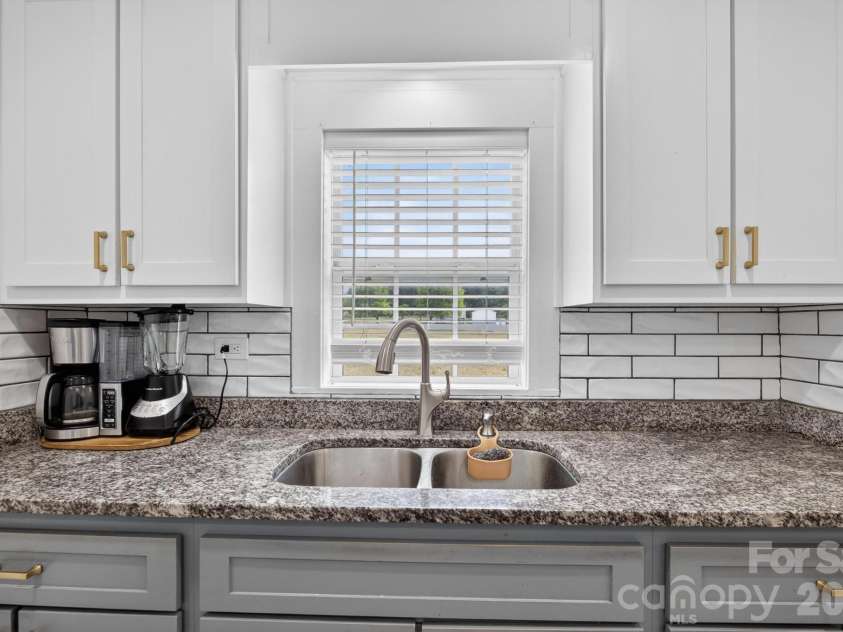 2076 Connelly Springs Road, Lenoir, NC 28645.  MLS# CAR4380178, YatesRealty ID 25293. Subway tile backsplash
