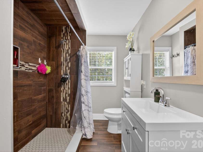 2076 Connelly Springs Road, Lenoir, NC 28645.  MLS# CAR4380178, YatesRealty ID 25293. Tiled walk-in shower