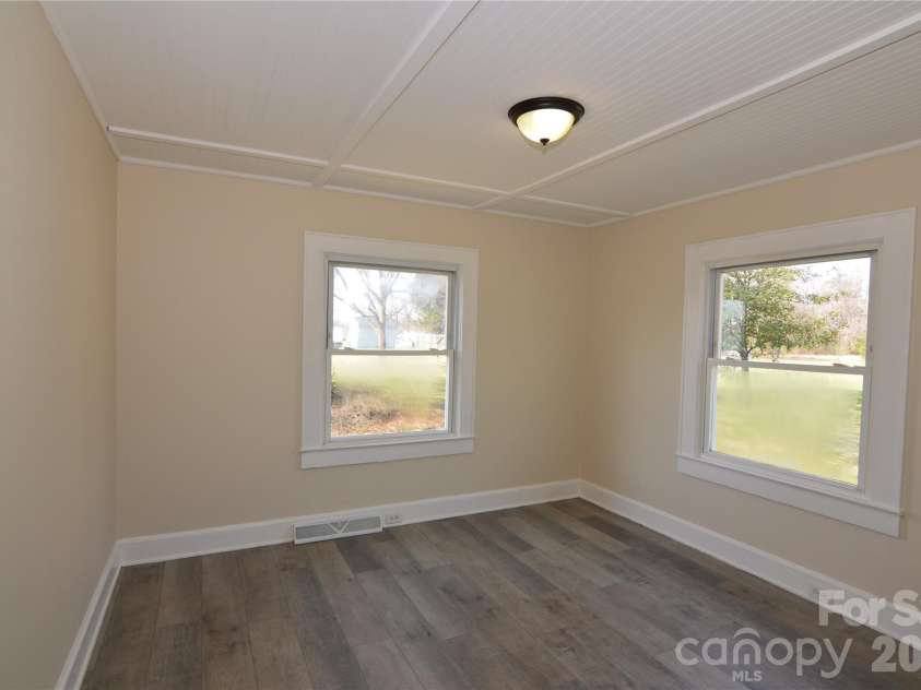 500 Gann Street, Lowell, NC 28098.  MLS# CAR4354875, YatesRealty ID 25294. Bedroom 1