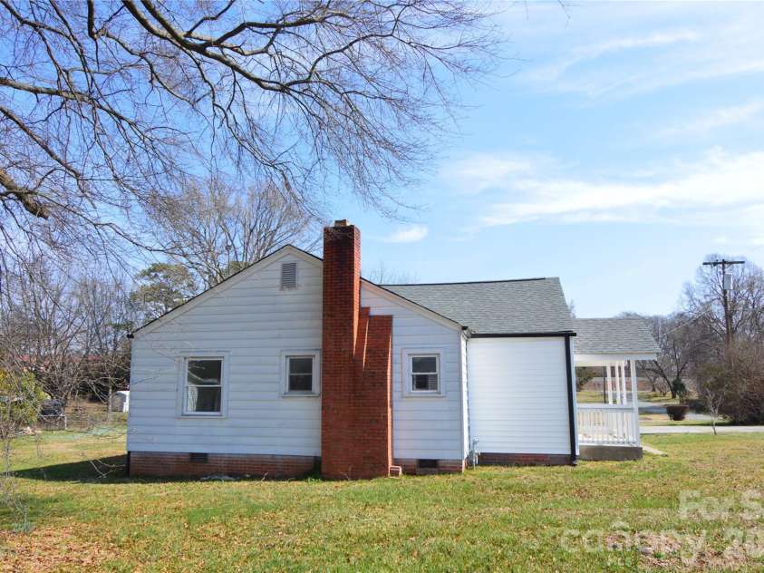 500 Gann Street, Lowell, NC 28098.  MLS# CAR4354875, YatesRealty ID 25294. Left Side View