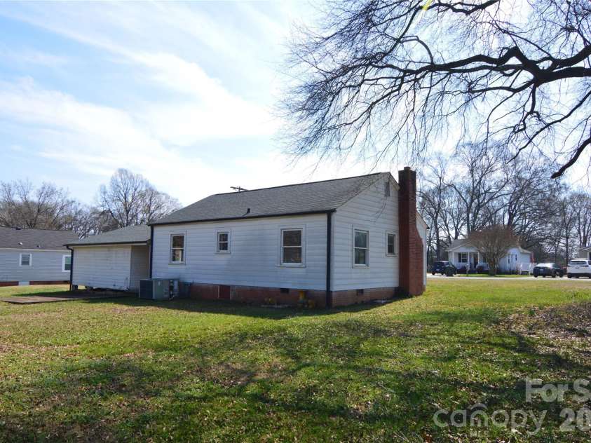 500 Gann Street, Lowell, NC 28098.  MLS# CAR4354875, YatesRealty ID 25294. Rear View