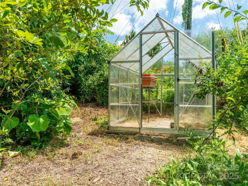 83 5th Avenue, Asheville, NC 28806.  MLS# CAR4275954, YatesRealty ID 25294. Greenhouse