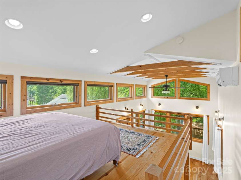 83 5th Avenue, Asheville, NC 28806.  MLS# CAR4275954, YatesRealty ID 25294. Loft sleeping area in tiny cottage