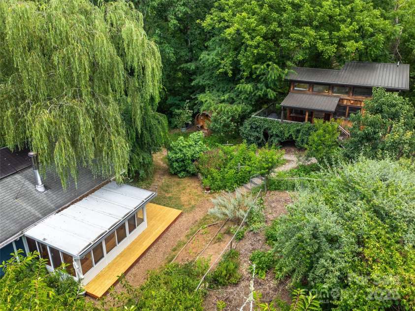 83 5th Avenue, Asheville, NC 28806.  MLS# CAR4275954, YatesRealty ID 25294. Lovely view of the gardens and both homes.