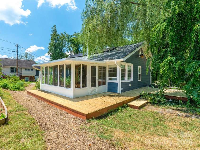 83 5th Avenue, Asheville, NC 28806.  MLS# CAR4275954, YatesRealty ID 25294. New decking around and back of the main home