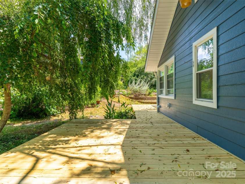 83 5th Avenue, Asheville, NC 28806.  MLS# CAR4275954, YatesRealty ID 25294. New decking around main home.
