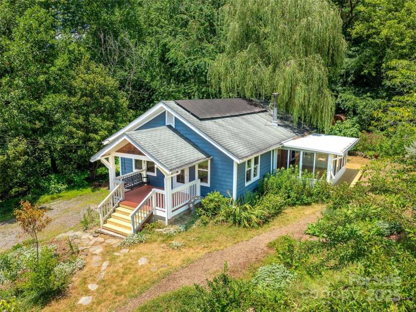 83 5th Avenue, Asheville, NC 28806.  MLS# CAR4275954, YatesRealty ID 25294. Offset energy costs with solar PV.