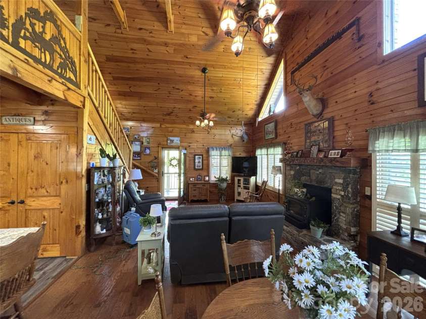 361 Black Camp Gap Road, Maggie Valley, NC 28751.  MLS# CAR4383045, YatesRealty ID 25299. Dining area and living room.