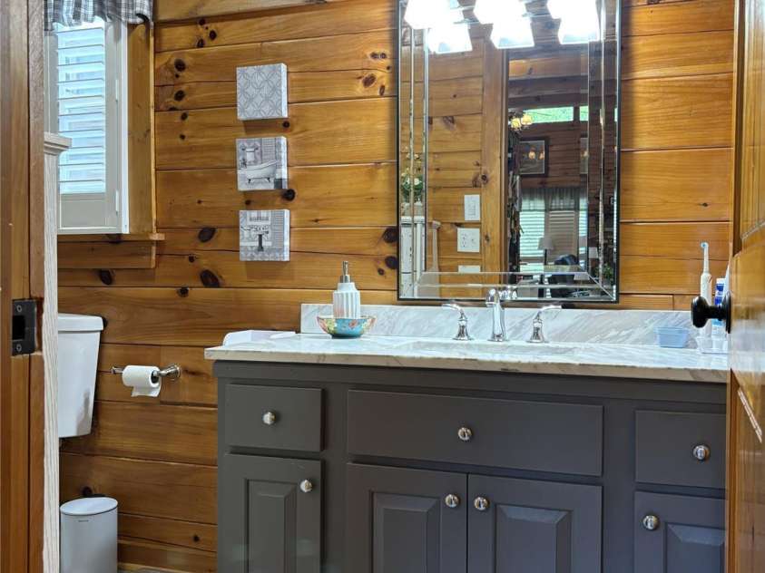 361 Black Camp Gap Road, Maggie Valley, NC 28751.  MLS# CAR4383045, YatesRealty ID 25299. Main level, full bathroom.
