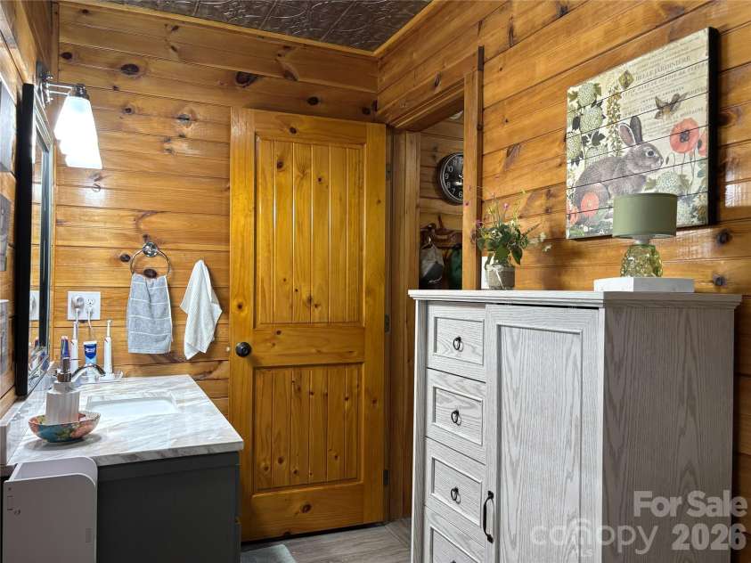 361 Black Camp Gap Road, Maggie Valley, NC 28751.  MLS# CAR4383045, YatesRealty ID 25299. Main level, full bathroom.