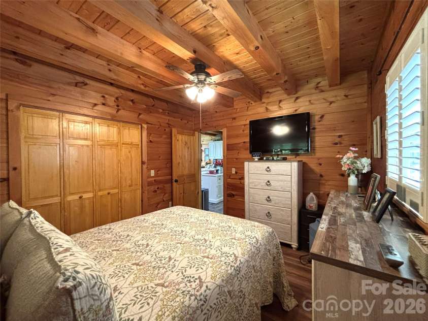 361 Black Camp Gap Road, Maggie Valley, NC 28751.  MLS# CAR4383045, YatesRealty ID 25299. Main level, primary bedroom.