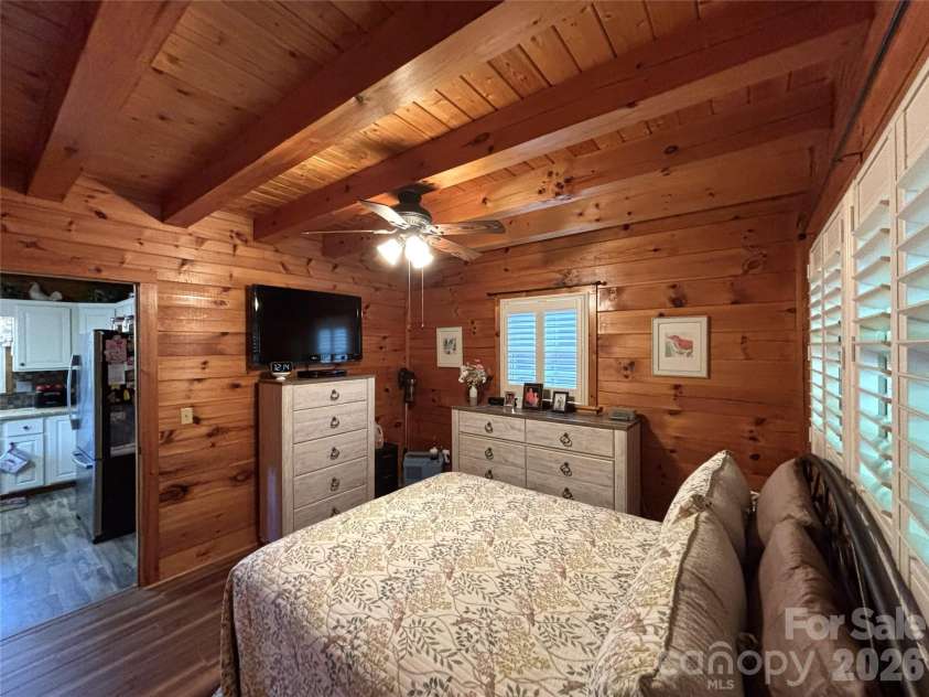 361 Black Camp Gap Road, Maggie Valley, NC 28751.  MLS# CAR4383045, YatesRealty ID 25299. Main level, primary bedroom.