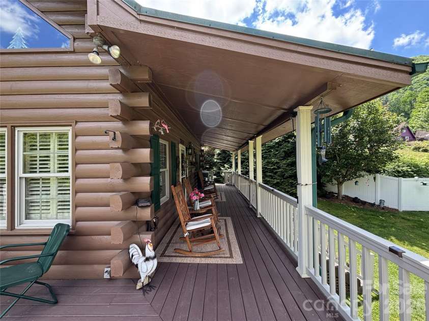 361 Black Camp Gap Road, Maggie Valley, NC 28751.  MLS# CAR4383045, YatesRealty ID 25299. Spacious covered deck