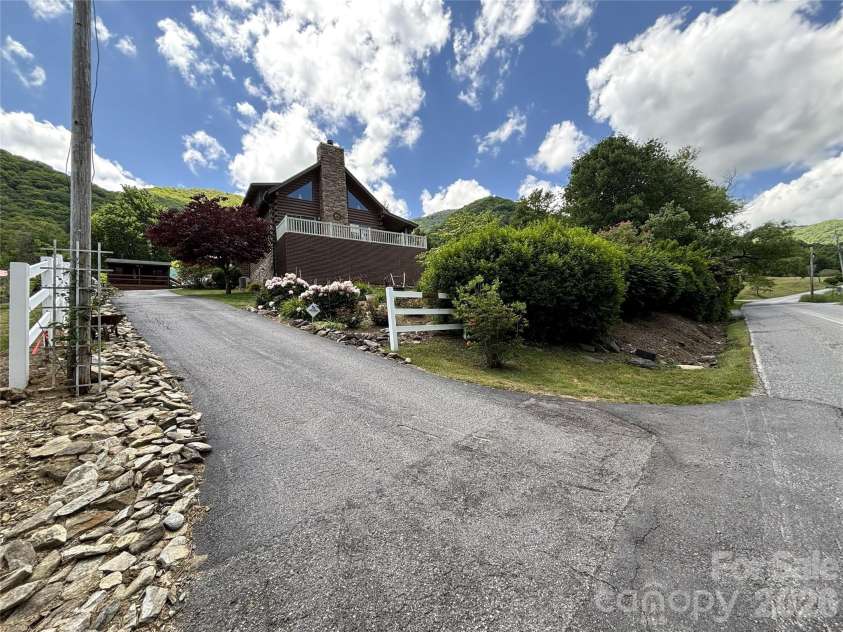 361 Black Camp Gap Road, Maggie Valley, NC 28751.  MLS# CAR4383045, YatesRealty ID 25299. View from street.