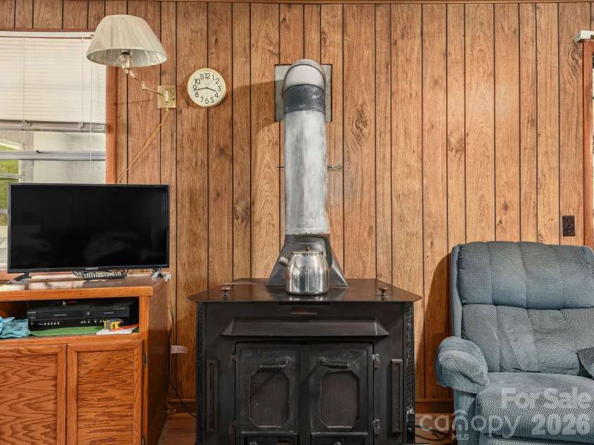 379 Fork Road, Barnardsville, NC 28709.  MLS# CAR4378726, YatesRealty ID 25301. Cozy Wood Stove Warmth