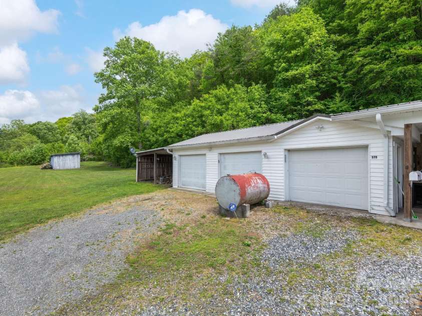 379 Fork Road, Barnardsville, NC 28709.  MLS# CAR4378726, YatesRealty ID 25301. Detached Garage & Workspace