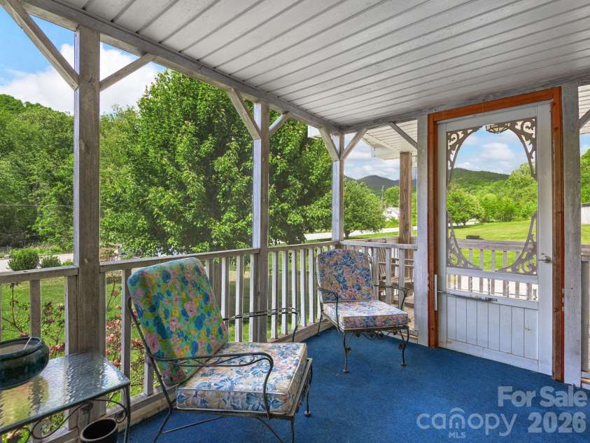 379 Fork Road, Barnardsville, NC 28709.  MLS# CAR4378726, YatesRealty ID 25301. Screened Porch Front Entry