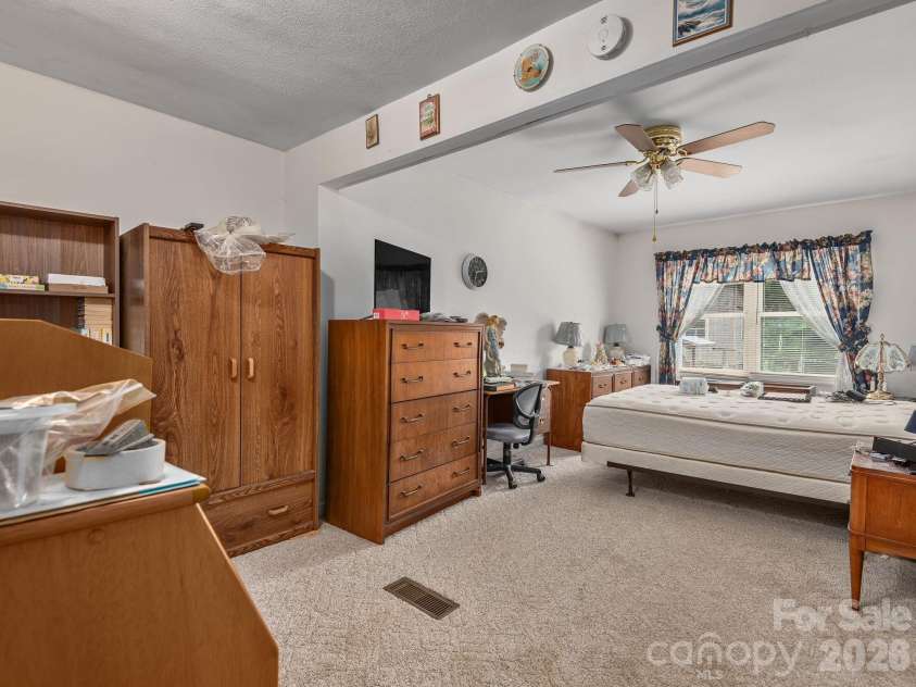 379 Fork Road, Barnardsville, NC 28709.  MLS# CAR4378726, YatesRealty ID 25301. Spacious Primary Bedroom with Flex Space