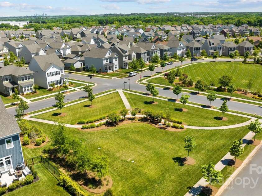 1033 Dorsey Drive, Fort Mill, SC 29715.  MLS# CAR4258362, YatesRealty ID 25303. McCullough community greenspaces throughout